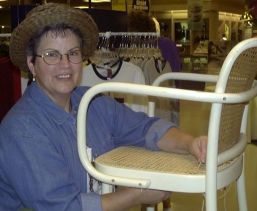 Cathryn demonstrating Hole-to-Hole Chair Caning.