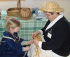 Cathryn Peters demonstrating bee skep making
