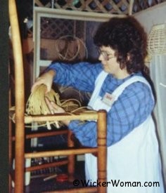 Cathryn Peters weaving a paper rush seat