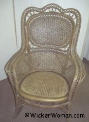 1880s Victorian Wicker Rocker with Spiderweb cane back and cane seat.