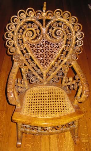 Heart motif child's wicker rocker