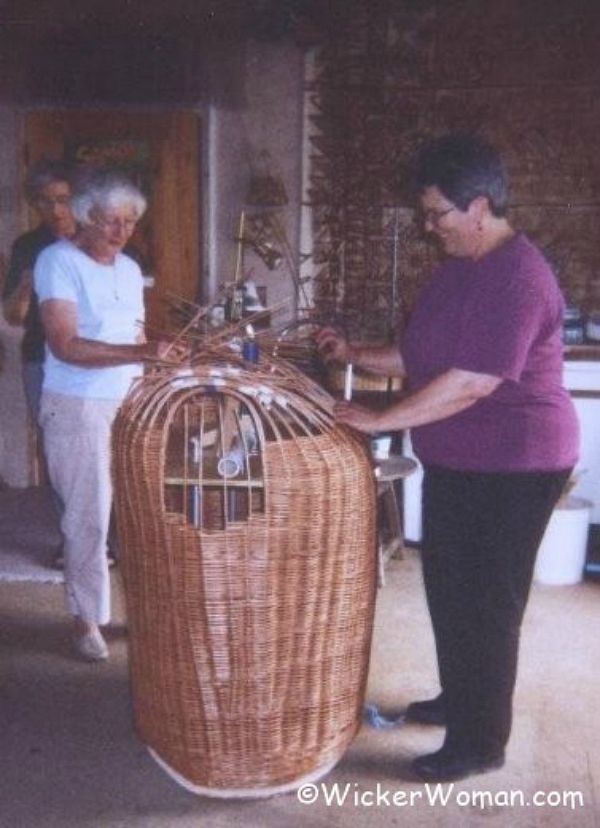 Olivia and Cathryn working on shoulders of willow giants