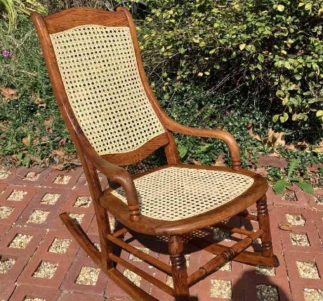 Lincoln rocker with caned seat and back woven by Coral Vincent at Coral's Caning Corner in Scottsburg, IN.