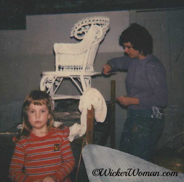 Brush painting a Victorian wicker chair 