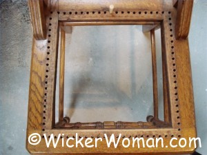 seat has drilled holes for hand caning
