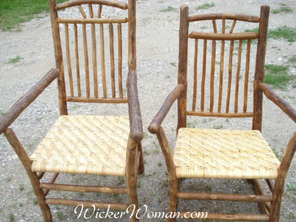 Wide binding cane seats on Old Hickory chair and rocker.