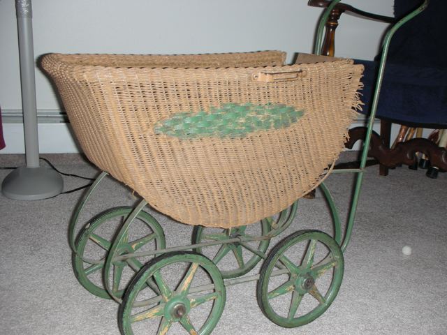 Base unit of Lloyd Loom doll buggy, needing repair.
