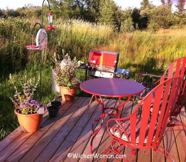 New back porch deck to watch hummingbirds and the sunrise while sitting at the bistro table and chairs.