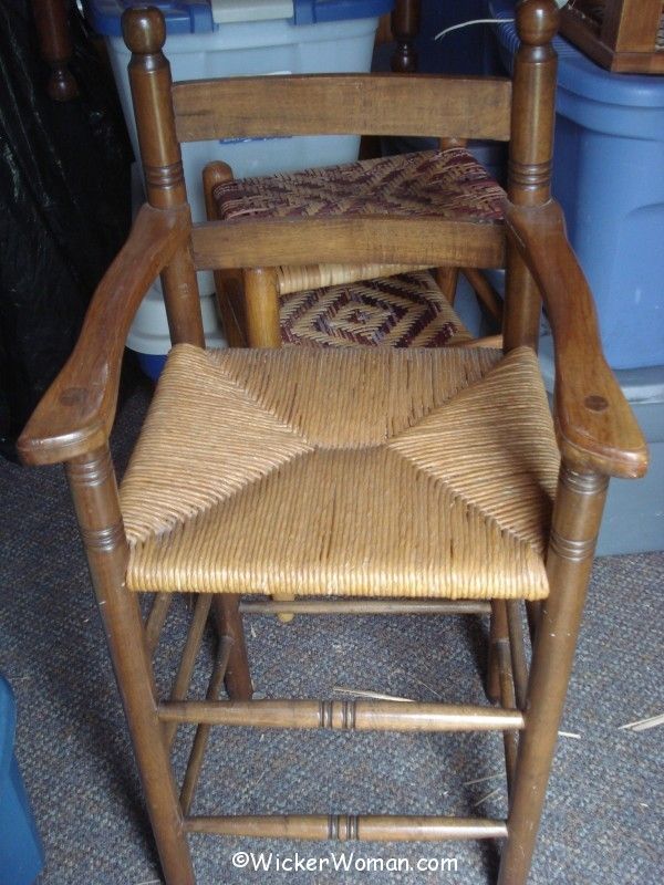 2015 walnut youth high chair with its paper rush woven seat by Cathryn Peters for her son in 1976.
