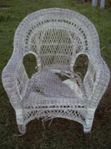 Weather damaged wicker chair.