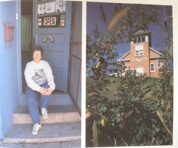 Cathryn Peters, sitting on the front steps of The Wicker Woman wicker shop. 