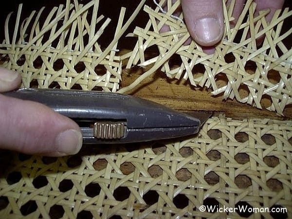 cut off excess cane webbing