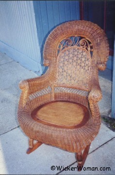 Gentleman's Victorian Wicker Rocker with Star of David cane in the back and a close woven cane webbing seat and "birdcage" front legs.